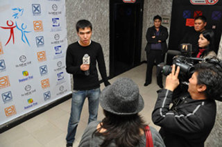 Youth for Human Rights Kazakhstan’s chief organizer is interviewed on television.