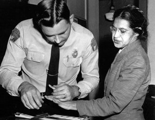 Rosa Parks being fingerprinted
